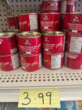 De Rica Tomato Paste 28% cans on shelf