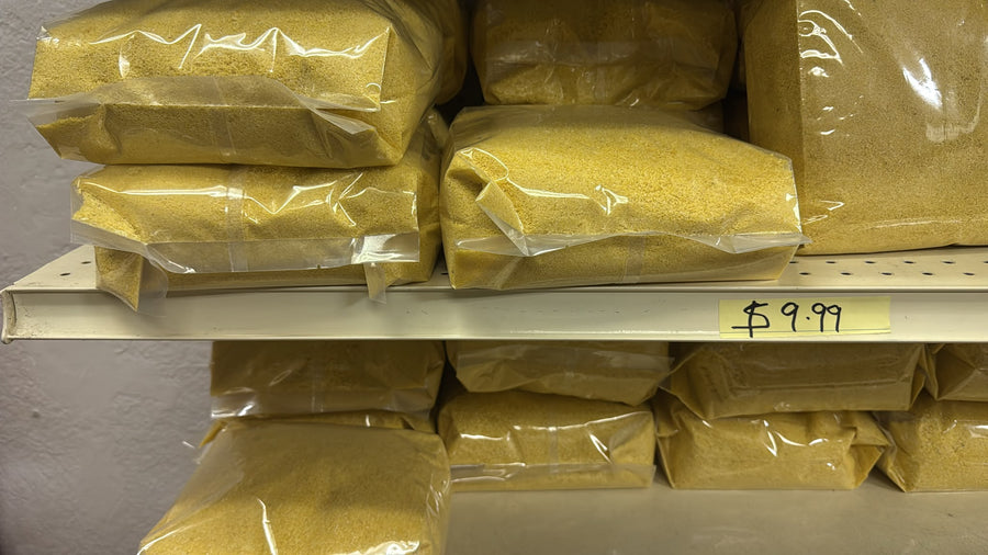 Yellow Garri 5lb bags on shelf